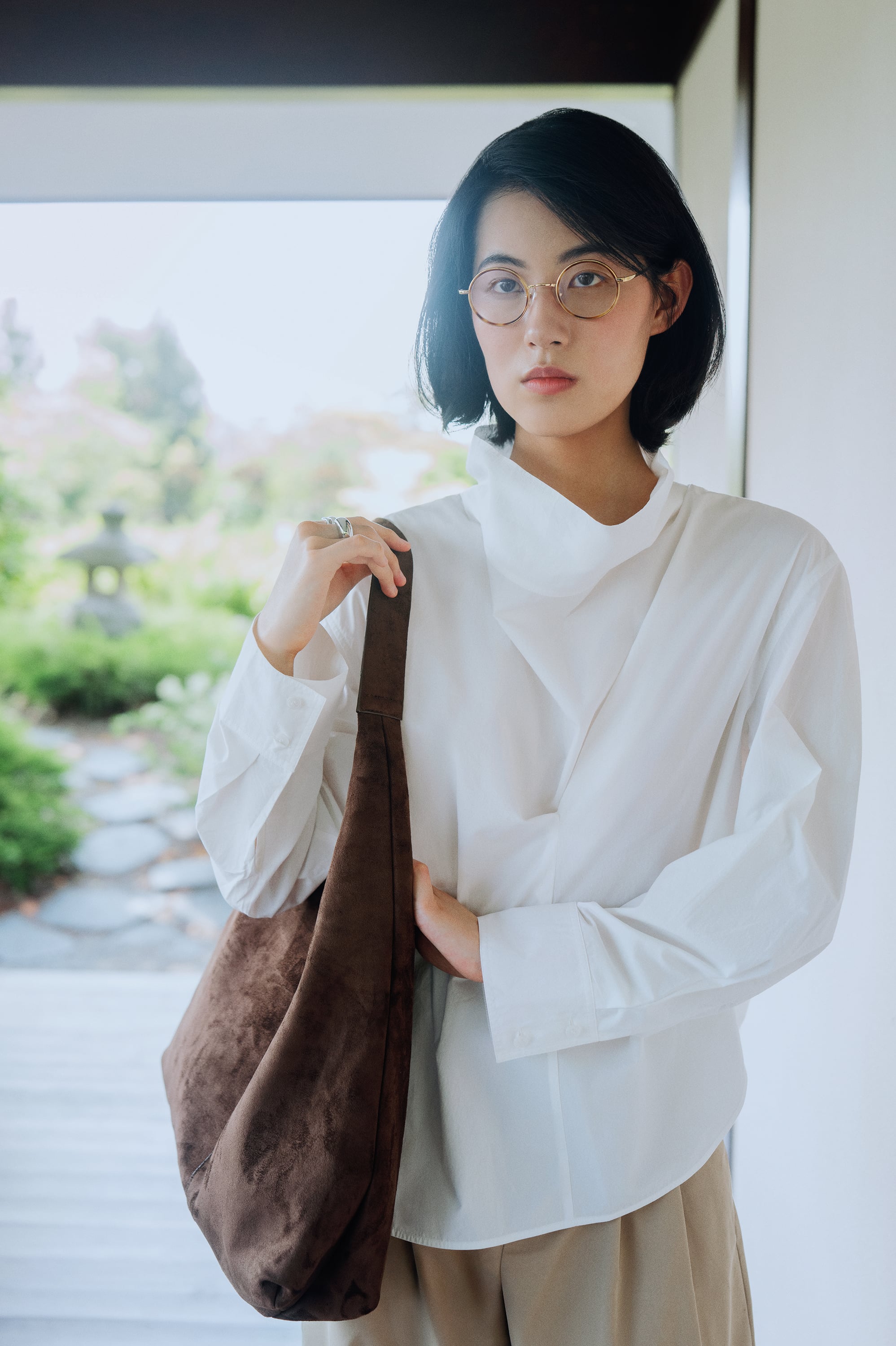 Woman wearing O+ Made in Japan eyewear
